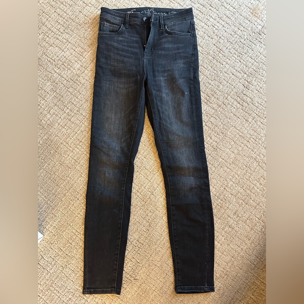 Guess black stretch “ultimate skinny” denim jeans
